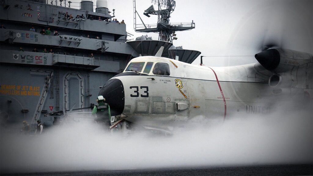 Shot of a C2 Greyhound taking off from an aircraft carrier. 